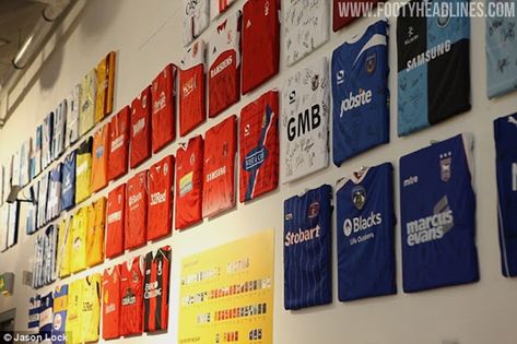 Football Jersey Display Ideas, Sports Office Decor, Sports Jersey Display, Race Bib Display, Sports Memorabilia Display, Old Football Shirts, Football Museum, Soccer Room, Sports Office