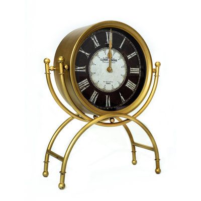 Inspired by the famous street in Paris, this Rue Victor-Hugo tabletop clock blends elegance with vintage charm and is the perfect decorative accent for living rooms, offices, bedrooms, and more. It blends with décor styles ranging from retro to baroque, Venetian to vintage, steampunk to Parisian, and everything in between. Constructed of durable metal, the battery-operated clock has a glass cover and rustic Roman numerals. The clock face features the words "Clement Audierne and Rue Victor Hugo P Street In Paris, Deco Accessories, Vintage Steampunk, Cool Clocks, Tabletop Clocks, Ashley Furniture Homestore, Desk Clock, Table Clock, Vintage Vanity