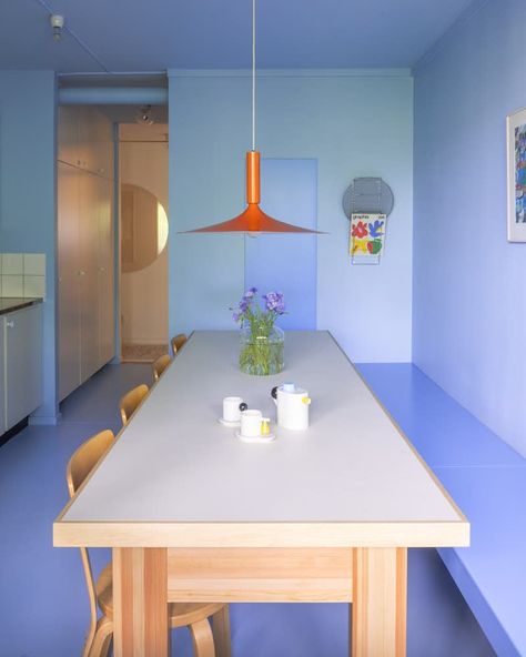 Photo 3 of 16 in This Renovated Apartment’s Primary Color Scheme Is Anything But Basic - Dwell Dining Table Along The Wall, Linoleum Dining Table, Colourful Ceiling Design, Blue Ceiling Kitchen, Colour Dining Table, Coloured Dining Chairs, Primary Color Scheme, Playful Interior Design, Colourful Ceiling