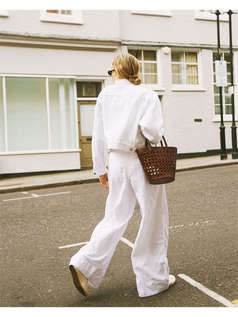 Alternative to jeans: Lucy Williams wears crisp white linen trousers teamed with a white denim jacket and brown basket bag Brown Basket, White Linen Trousers, White Summer Outfits, Fashion Me Now, Lucy Williams, White Wide Leg Pants, Beige Outfit, White Denim Jacket, All White Outfit