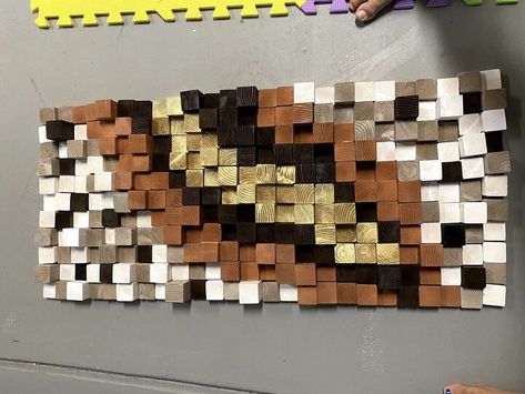 I wanted to create a wall art which is easily made using spare wood. It can be used to decorate any space in your home. Here’s how we made it: You will need many 2x2 blocks of different heights. I used 1.25, 1.5in, 1.75in and 2in blocks. For this get 2x2s and cut them using a miter saw. Now, arrange the blocks in a pattern that you like on a quarter inch plywood. There is no specific pattern, just put them randomly and see if you like it. Next, select some spray paints with col… Art Assignments, Spray Paints, 3d Abstract, Block Wall, Miter Saw, We Made It, Wall Cladding, The Blocks, Wooden Art