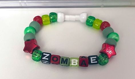 Horror Bracelet Ideas, Candy Bead Bracelet Ideas, Zombie Kandi, Funny Bracelet Ideas, Homestuck Kandi, Band Kandi, Kandi Ideas Words, Zombie Accessories, Kandi Bracelet Ideas