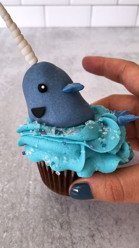 lindseybakedthis on Instagram: “Byeeee Buddy, hope you find your dad” - Mr. Narwhal 🐳❄️ Cake pop on a cupcake 😋 Wilton tips 2D, 352, and 3 with fondant smile and horn.… Narwhal Cake, Mr Narwhal, Birthday Cupcakes Decoration, Wilton Tips, Ganache Cake, Holiday Cupcakes, Graduation Cupcakes, Christmas Cake Decorations, 21st Birthday Cake