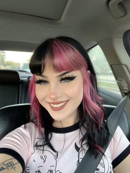 Half Color Half Black Hair, Split Pink And Black Hair, Light Pink And Black Split Dye, Blue Hair Pink Bangs, Front Half Of Hair Dyed, Black Pink Split Dye, Pink Hair Streaks With Bangs, Trendy Dyed Hair 2023, Color Block Purple Hair