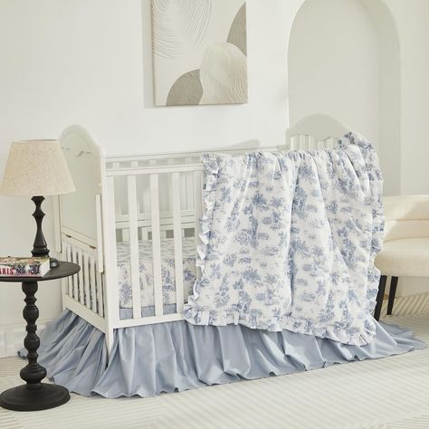 White crib boy nursery