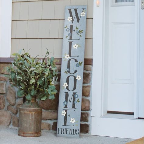 PRICES MAY VARY. Highest Quality Materials: This handcrafted Porch Board Hanging Welcome Sign and Porch leaner is made of a specially developed, 100% weatherproof, composite material that will not rot, warp, or fall apart with rain. It is printed with weatherproof UV Inks that won't fade, peel or crack. It measures 8"x 46.5"x .4, weighs 3.5 lbs. and is designed for both Outside and Inside home, door and porch decoration use. Beautifully Crafted Sign for Every Occasion: Our Friends with Flower ve Porch Leaner With Planter, Double Sided Welcome Porch Sign, Fall Porch Leaners, Tall Welcome Sign, Welcome Sign Ideas, Spring Welcome Sign, Board Welcome Sign, Door Stand, Porch Leaners