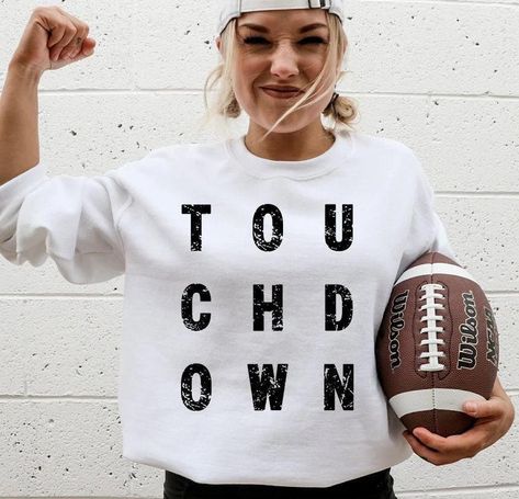 TOUCHDOWN T-SHIRT *printed on a comfort colors tee, or a Bella canvas sweatshirt  SHIRT INFO- comfort colors is a  unisex adult heavyweight 100% ring spun preshrunk cotton, soft washed garment dyed fabric sweatshirt is a classic unisex pullover crewneck sweatshirt in comfy, super-soft fleece designed for warmth and breathability.  Offered in poly-cotton sponge fleece.   SIZING CHART- shirts are unisex (looser fit) please see images for measurements CARE INSTRUCTIONS- wash on cold, and inside out Cute Crewneck Sweatshirt, Sports Attire, Cute Crewneck, Football Mom Shirts, Print Transfer, Football Sweatshirt, Dtf Print, Football T Shirt, Football Mom