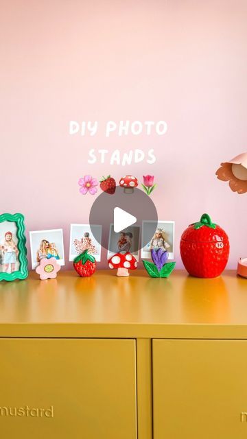 Lydia Rowley on Instagram: "✨🍄🌷🍓🌸 DIY PHOTO STANDS 🌸🍓🌷🍄✨
•
The cutest way to display your photos. And a reminder to print them out - don’t just keep them on your phone!!
•
I used air dry clay, finished with acrylic paint and gloss varnish! ✨
•
•
•
•
•
#photoframes #clayartist #clayvase #diyphotoframe #claysculpture #claylove #recycleandplay #recyclemeplay #recycledhome #upcycledart #strawberry🍓 #diygirl #sustainablecraft #zerowastelifestyle" Air Dry Clay Photo Stand, Photo Stand Diy, Diy Photo Stand, Air Dry Clay Ideas, Library Programming, Summer Art Projects, Air Clay, Art 2023, Pot Design