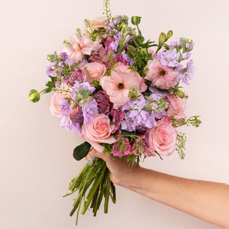 Life is getting a bit warmer, Spring is practically here, Easter will come and so will all the bright, colorful flowers that we are all craving! Perfectly pastel and filled with all the best Springtime blooms, this Ready-made bouquet is packed with lavender stock, La Vie En Roses, and the elusive Butterfly Ranunculus!