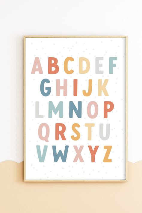 A, B, C, learn the alphabet with me! This colorful, pastel rainbow alphabet print makes the perfect addition to any kid's bedroom or playroom and is great for homeschooling, classrooms, preschools and more. Toy Nook, Playroom Posters Free Printables, Playroom Alphabet Wall, Nursery Alphabet Wall, Abc Prints, Nursery Room Wall Decor, Abc Printable, Kids Abc Wall Art, Playroom Inspiration