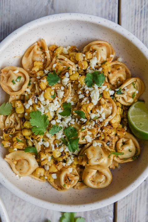 Trader Joes Tortellini Recipe, Trader Joes Meals Vegetarian, Trader Joes Everything But The Elote Seasoning Recipes, Trader Joe Pasta Recipe, Trader Joe’s Mexican Corn, Trader Joe’s Tortellini, Trader Joe’s Roasted Corn, Trader Joes Roasted Corn Recipes, Trader Joe’s Pasta Salad