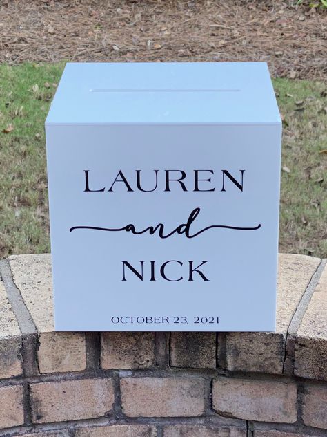 "This beautiful personalized card box will be the center of attention on your gift table. Guests can easily drop their cards in without fear of them getting lost. After your big day, this box will be perfect for your wedding memorabilia, keepsakes, money, wine corks, etc. Acrylic box is white with black vinyl (Shown) The FONT pictured in this listing will be the font used, unless you contact me for a different font or a customized box. This box is 10\"x 10\"x 10, and is custom made exclusively f Black And White Card Box Wedding, Wedding Letter Box Ideas, Black Card Box Wedding, Wedding Box For Money, Wedding Card Box Ideas Elegant, Wedding Money Box Ideas, Acrylic Card Box Wedding, Wedding Card Box Ideas, White Wedding Card Box