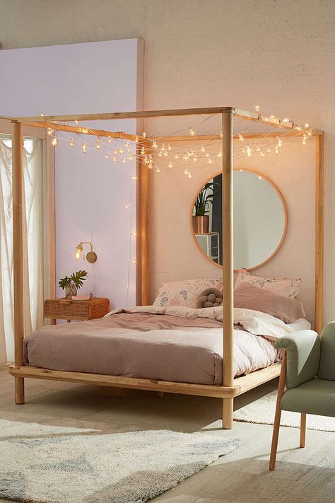 Urban Outfitters Eva Wooden Canopy Bed  | Scandinavian Design Interior Living | #scandinavian #interior Wooden Canopy Bed, Cozy Bedroom Lighting, Wooden Canopy, Bilik Tidur, Versace Home, غرفة ملابس, Farmhouse Bedroom Decor, Canopy Bed, Room Ideas Bedroom