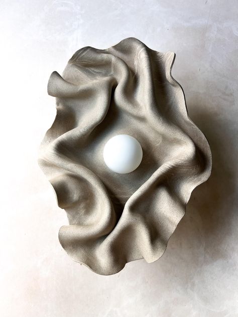 Brown Ceramic wall sconce, Sculptural ceramic wall light, ceramic lighting, unique wall light, brown wall light art THIS IS MADE TO ORDER. PLEASE ALLOW 5-7 WEEKS FOR ITEM TO  SHIP Handbuilt ceramic wall sconce with draped/folded  marbled stoneware clay, reminiscent of the natural world. Meticulously crafted by the artist, The nature of the technique used to shape the clay adds a touch of uniqueness to each piece. The sconce features a distinctive design with draped clay, evoking the graceful flo Stone Wall Light, Wall Light Art, Fireplace Inspiration, Ceramic Lighting, Unique Wall Lights, Tequila Bar, Ceramic Wall Lights, Brown Wall, Brown Ceramic