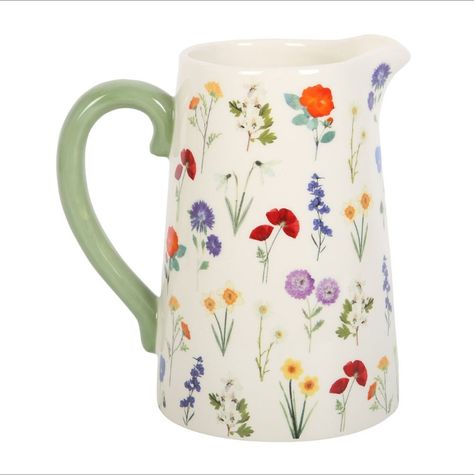 This ceramic jug/vase is perfect for adding a touch of spring to your home décor The multicoloured flower pattern makes it a great addition to any room, whether you use it to hold flowers or simply as a decorative piece Made of high-quality ceramic, it is both durable and beautiful The intricate flower design is perfect for those who love the beauty of nature, and the jug shape adds a touch of vintage charm.  This Wild Spring Flowers Jug/Vase is ideal for those who want to add a touch of colour and elegance to their home Whether you are a collector of vases or simply looking for a beautiful accent piece, this ceramic jug/vase is sure to impress 18cm Wildflower Ceramic, British Wildflowers, British Flowers, Jug Vase, Ceramic Jug, Holding Flowers, Photo Box, Ceramic Flower, Water Jug