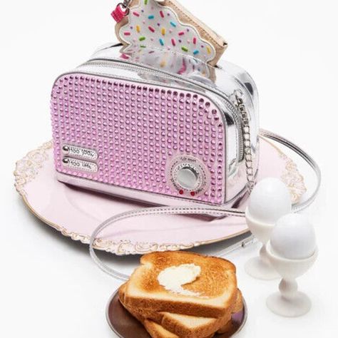 Betsey Johnson Kitsch Get Toasted Pink Crossbody Bag *2 Piece Set* Bj34510m "We Sell To Collectors" Brand New In Sealed Package With Tags It's Time To Get Toasty! And What Better Way Than With This Decked-Out Toaster-Shaped Crossbody Bag. It's The Perfect Way To Make A Retro Statement When You're Out And About! Heading To A '90s-Themed Party? Make It A Set By Pairing It With The Pop Tart Change Purse. Manmade Materials With Rhinestones 8.5"L X 4"D X 5.5"H Imported Style Name: Bj34510m Novelty Purses, Betsey Johnson Purses, Unique Backpacks, Cream Bags, Popular Handbags, Pink Crossbody Bag, Unique Purses, Novelty Bags, Betsey Johnson Bags