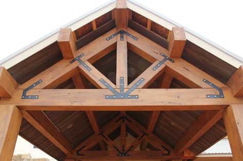 Timber trusses make from concrete for exterior residential and commercial applications. Timber Trusses, Timber Frame Porch, Timber Frame Joinery, Roof Truss Design, Wood Truss, Timber Truss, Timber Frame Building, Deck Decor, Building A Garage