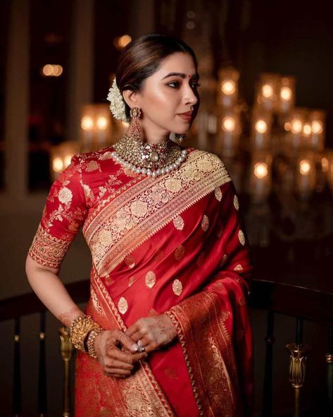 Aarti Ravi in a red saree by Sabyasachi 2 Reception Saree Look, Aarti Ravi, Reception Saree For Bride, Red Saree Wedding, Sabyasachi Sarees, Reception Saree, Bridal Sarees South Indian, Indian Bride Outfits, Bridal Lehenga Collection