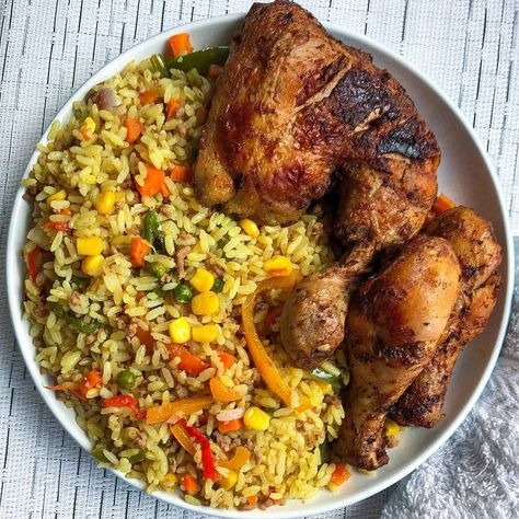 Fried Rice And Chicken Photography, Fried Chicken And Rice Recipe, Ghana Fried Rice And Chicken, Fried Rice And Chicken Recipes, Freid Rice, Rice And Grilled Chicken, Fried Chicken With Rice, Cameroonian Food, Fried Rice And Chicken