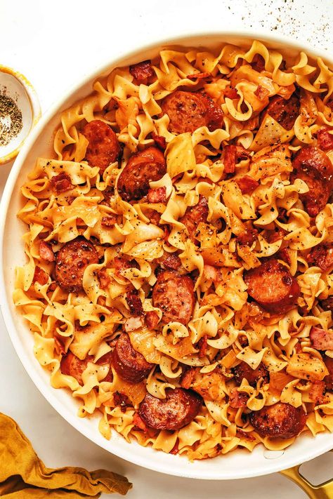 Kielbasa and Cabbage Noodles Cabbage Kielbasa, Cabbage Noodles, Sausage And Cabbage, Kielbasa And Cabbage, Cabbage And Noodles, Paprika Sauce, Cabbage And Sausage, Gimme Some Oven, Green Cabbage