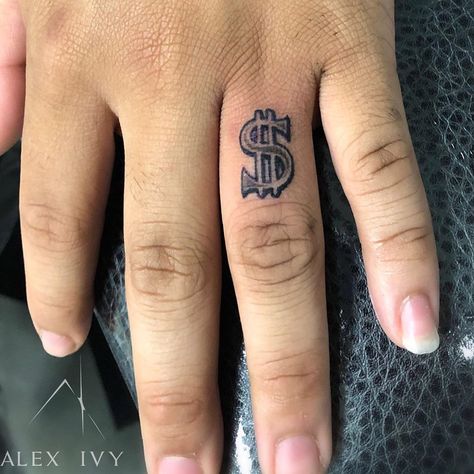 Money Bag Finger Tattoo, Money Finger Tattoo, Dollar Sign Face Tattoo, Money Symbol Tattoo, Small Money Tattoo, Outcast Tattoo, Dollar Tattoo Ideas, Cynthia Luz, Money Sign Tattoo