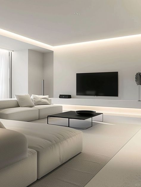 This minimalist decoration takes simplicity and grandeur as its core.
With white as the main color,
The light gray tone of the walls and ceiling is used as a supplement.
Together they create a bright and spacious visual effect.
The combination of TV and black low coffee table,
Not only practical and modern,
At the same time, the use of black elements also enhances the sense of stability in the space. Clean Minimalist Living Room, Tv Wall White, Low Ceiling Design, Minimalist Tv Wall, Low Ceiling Living Room, Barang Aesthetic, Minimal Living Room, Latest Living Room Designs, Low Coffee Table