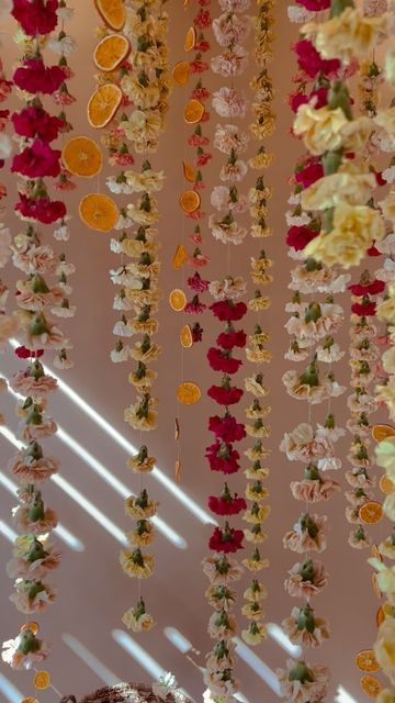 corie sielaff on Instagram: "Remember all those strung flowers we did?!? Well they still looked amazing even 2 days after the wedding !!! Had to hang them up in studio 🖤 soooo dreamy!!!! Wish I could keep this up forever! . . #flowers #strungflowers #flowergarland #hangingflowers #blooms #floraldesign #carnations #dreamy #fyp #flowersofinstagram #floristsofinstagram #loveit #love #tranquil #calming #calm #relaxing #satisfying #satisfyingvideos #like #orangepeels #colorful #designinspo #flowerlo Indian Floral Decor, Carnation Garland, Carnation Wedding, Garland Wedding Decor, Dream Wedding Decorations, After The Wedding, Mehndi Decor, Forever Flowers, Floral Backdrop