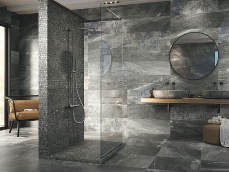 Concrete- and stone-look tile options give a great, low maintenance, easily-installed alternative to the original materials. These are often popular for modern interiors and large, neo-traditional spaces. Gorgeous Bathroom Tile, Indian Bathroom, Non Slip Bathroom Flooring, Interlocking Tile, Shower Floor Tile, Tile Trends, Tile Manufacturers, Bathroom Tile Designs, Stone Look Tile