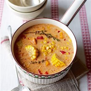 Jamaican spiced corn soup  I can hardly wait to try this! I know its almost summer but I love a good bowl of soup anytime. Corn & sweet coconut milk just sounds too good to wait for the seasons to change. I'll turn  the A/C down and call it fall for today! Corn Soup Recipes, Jamaican Cuisine, Jamaican Dishes, Corn Soup, Porto Rico, Jamaican Recipes, Corn On The Cob, Bowl Of Soup, Caribbean Recipes