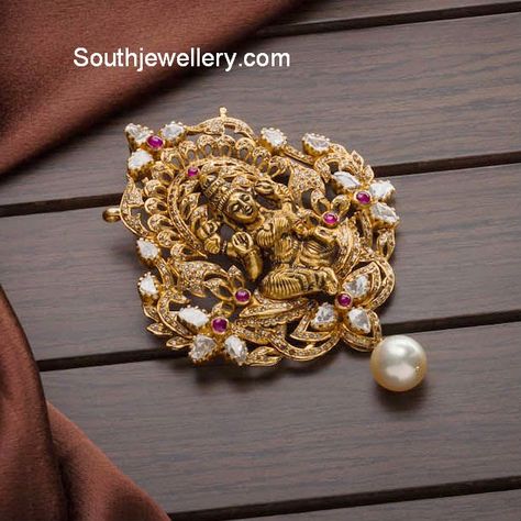 22 carat gold antique finish Goddess Lakshmi pendant studded with flat diamonds, diamonds, rubies and south sea pearl drop. Lakshmi Pendant, Gold Pendent, Locket Design, Gold Temple Jewellery, Gold Jewelry Simple Necklace, Gold Necklace Indian Bridal Jewelry, Antique Jewelry Indian, Gold Wedding Jewelry, Gold Pendant Jewelry