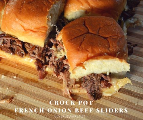 Everything you love about french onion soup is wrapped up in between Hawaiian rolls with this crock pot French Onion Beef Slider recipe. French Onion Sliders, Hawaiian Roll Ham Sandwiches, Pot Roast Sliders, Hawaiian Sandwiches, Slow Cooker Dinner Healthy, Hawaiian Roll Sandwiches, French Onion Beef, Sliders Recipes Beef, French Dip Crock Pot