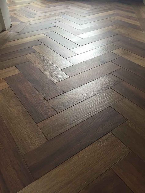 Dark wood effect porcelain floor tiles laid in a herringbone pattern Wood Floor Stairs, Wood Effect Floor Tiles, Porcelain Wood Tile, Herringbone Wood Floor, Herringbone Wood, Ceramic Floor Tile, Living Room Tiles, Wood Tile Floors, Wood Effect Tiles