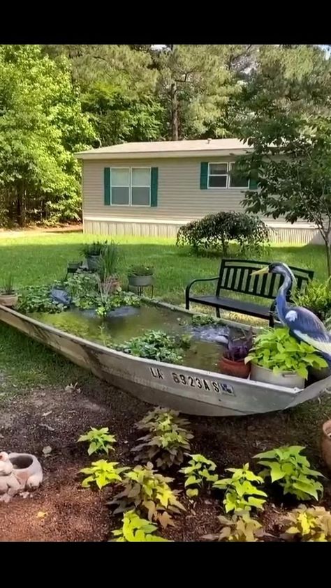 Repurposed old boat. | Fountains backyard, Waterfalls backyard, Diy ponds backyard Lakehouse Garden Ideas, Boat Pond, Creative Garden Ideas, Diy Ponds Backyard, Garden Pond Design, Diy Pond, Fountains Backyard, Pond Ideas, Waterfalls Backyard