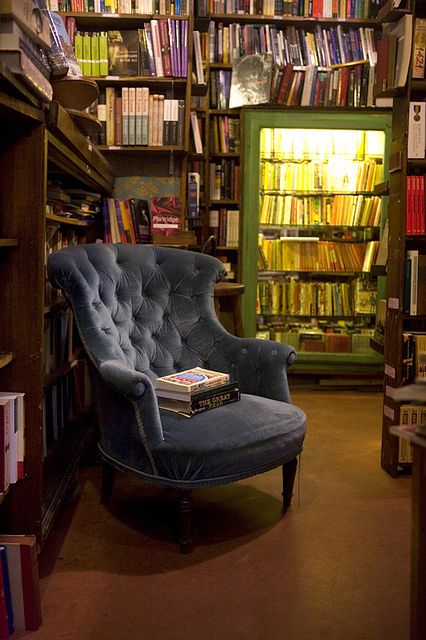 Shakespeare and Company by Cara Tobe Photo, via Flickr.  Blue Chair Aeron Chair, Lots Of Books, Dream Library, Chair Size, Home Libraries, Blue Chair, Reading Corner, Comfy Chairs, Herman Miller