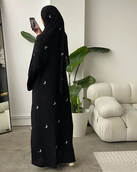 Beautiful Moon Embroidery Abaya With Hidden Button And Moon Embroidery Work Black Hijab 😍 Size Available - 50, 52, 54, 56, 58 Material- Premium Nida Fabric💯💓 Price - DM💫 . @azisha.in @azisha.in @azisha.in . . #azisha #trending #luxurylifestyle #luxuryaffordable #dubaiabayas #abayafashion #abayacollection #abayadubai #abayastyle #hijabfashion #hijabstyle #modestclothing #modestfashion #modestyfashion #explore #indianmuslims #muslimsoftheworld #fyp #fashion Printed Abaya Designs, Abaya Designs Black, Embroidery Abaya, Black Abaya Designs, Moon Embroidery, Black Hijab, Black Abaya, Modesty Fashion, Abaya Designs