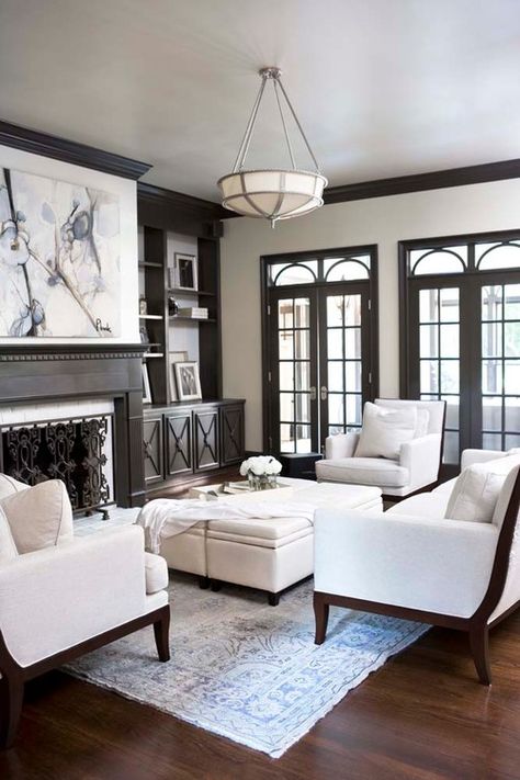 Remodelaholic | 25 Beautiful Examples of Colored Trim White Walls With Dark Brown Trim, White Walls Dark Brown Trim, Paint Colors Against Dark Wood, Espresso Trim Interior, Wood Vs White Trim, Living Room With Dark Wood Trim, Dark Trim Living Room, Brown Trim White Walls, Dark Walls White Furniture