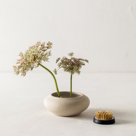 This small metal Kenzan, also known as a flower frog, is an essential tool used in the Japanese art of flower arranging, commonly referred to as Ikebana. The Kenzan supports thoughtfully placed stems in a vessel to showcase the natural movement and shape of each flower and foliage. Pairs beautifully with our Ikebana Vase No. 1 in both our Stoneware or Raw Stoneware finish. Brand: Convivial Made Of: Metal Sustainability Practices: Recyclable, durable, made from renewable resources, locally made. Ikebana Vases Ceramics, Ikebana Vase, Flower Arrangement Designs, Ikebana Arrangements, Ikebana Vases, Natural Movement, Vase Arrangements, Flower Holder, Flower Frog