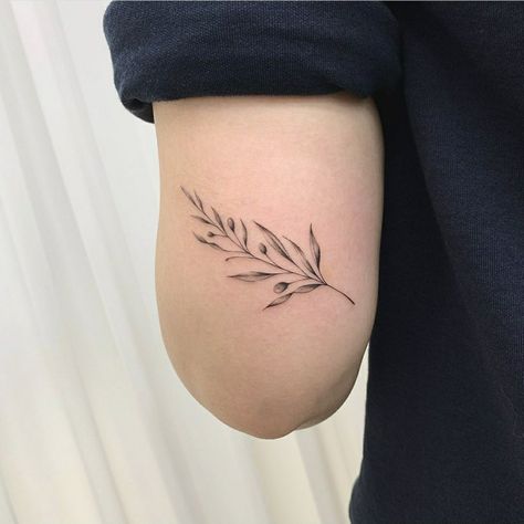 Unique Olive Branch Tattoo, Feminine Olive Branch Tattoo, Crossed Olive Branch Tattoo, Olive Branch Tattoo Back Of Arm, Olive Branch Tattoo Women, Minimalist Olive Branch Tattoo, Tattoo Olive Tree, Olive Branch Arm Tattoo, Olive Branch Wrist Tattoo