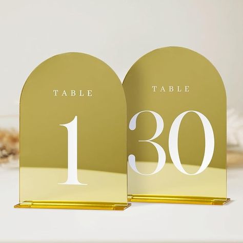 Amazon.com : JINMURY Gold Mirror Arch Table Numbers for Wedding, 30 Pack 5x7" Gold Mirror Arch Acrylic Table Signs with Stand Acrylic Table Numbers 1-30, Perfect for Wedding Reception(Gold Arch Table Numbers 1-30) : Home & Kitchen Acrylic Table Signs, Candle Backdrop, Arch Table Numbers, Table Numbers For Wedding, Arch Sign, Acrylic Arch, Arch Table, Gold Table Numbers Wedding, Christmas Wedding Favors