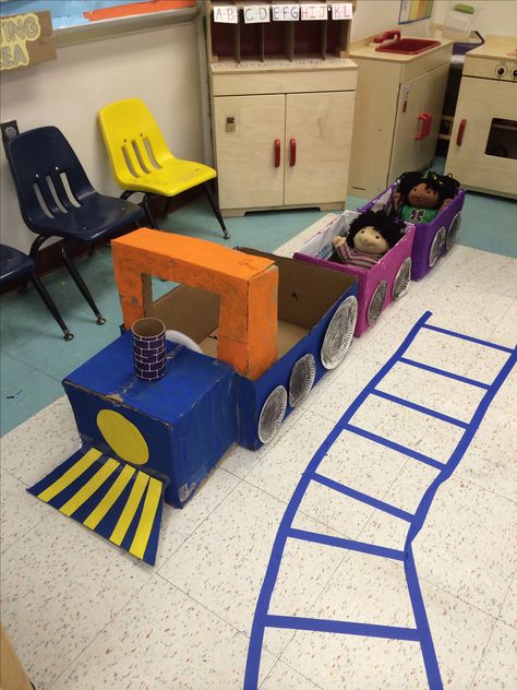 Train made out of card board boxes in my dramatic play center  #train Train Provocations, Train Preschool Theme, Ground Transportation Crafts Preschool, Train Ideas For Preschool, Train Dramatic Play Preschool, Transportation Theme Dramatic Play, Transportation Theme Preschool Dramatic Play, Train Dramatic Play, Bus Dramatic Play