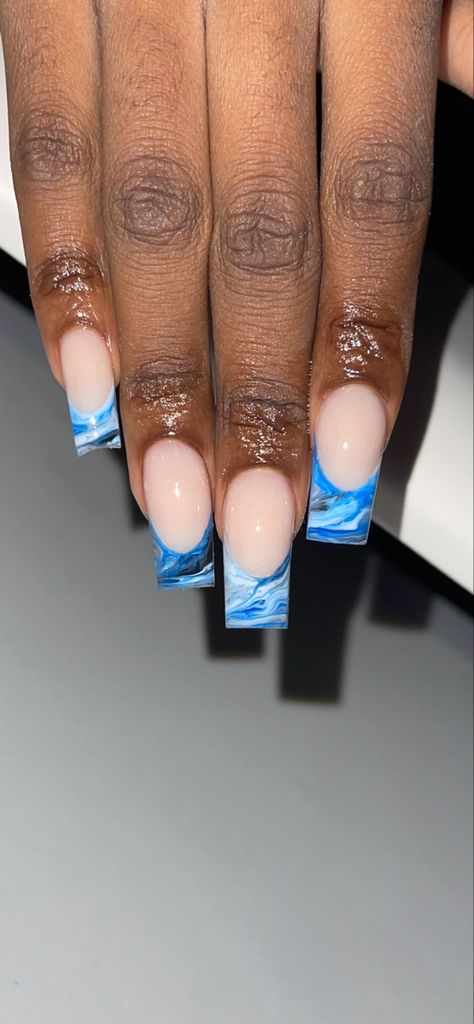 Blue french marble nails with a nude based colour Blue And White Marble Nails Acrylic, Black And White Marble French Tip Nails, Short Nail Marble Design, Marble French Tip Nails Short, Marble Nail French Tip, French Nail Designs Purple, Acrylic Nail Designs Blue And White, Short Blue French Tip Acrylic Nails, Marbled French Tip Nails