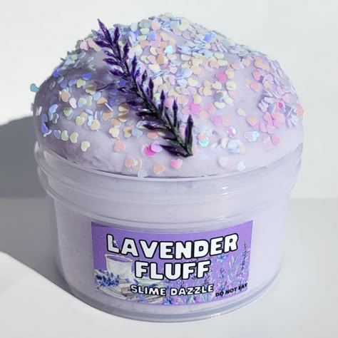 PRICES MAY VARY. Relaxing Cloud Slime Lavender Scented Great relaxing sensory slime for ages made in USA with non toxic ingredients CPC tested and ceritfied Scented with therapiutic grade lavender oil Lavender Fluff Relaxing Slime Lavender Scented TEXTURE: Cloud super drizzly easy to handle and relaxing to play with slime SCENT: Dreamy Lavender ADD-INS: Random Charm Each slime comes with 1 Activator Pen Spray FIXES STICKY SLIME 👍 1 per order If you need more activator you can purchase more at m Cool Slimes, Fluff Slime, Sensory Slime, Cheap Slime, Cute Slime, Sticky Slime, Jelly Slime, Pretty Slime, Playing With Slime