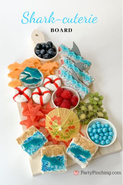 Shark-cuterie Board, best charcuterie board ideas for kids, best charcuterie board, cute charcuterie boards, best fruit trays, summer charcuterie, best summer charcuterie, shark week, shark fruit board, shark food, best shark party ideas, Little Debbie summer, Party Pinching Sharkcuterie Board, Shark Cuterie Board, Sharkuterie Board, Shark Week Food, Beach Desserts, Cuterie Board, Cute Charcuterie, Pool Entertaining, Shark Party Foods