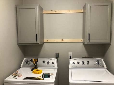 Affordable DIY Laundry Room Makeover - Life With The Hollidays Diy Laundry Room Cabinets, Cheap Laundry Room Makeover, Laundry Wallpaper, Storage Laundry Room, Wallpaper Laundry, Small Laundry Closet, Laundry Quotes, Diy Laundry Room Makeover, Laundry Closet Makeover