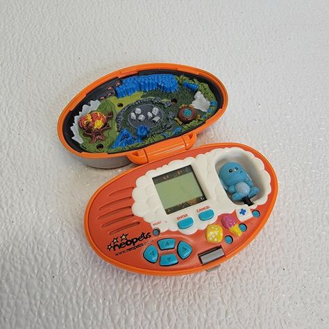 Tamagotchi Vintage, Dr Seuss Birthday Party, Vintage Tiger, Pokemon Pocket, Graphic Design Assets, Retro Gadgets, Pocket Pet, 90s Toys, Virtual Pet