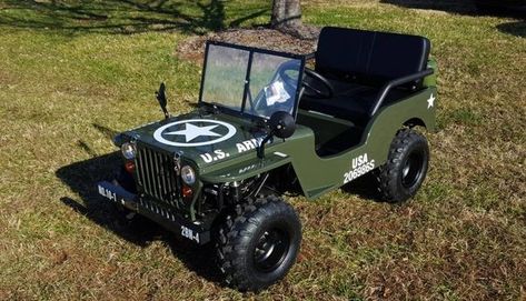 For parents who are automobile lovers and would like to give their kids something to play around. the 2017 No Make Mini Jeep US Army 125cc is a perfect gift for them. This mini Jeep a fully functional vehicle suitable for kids and for adults alike. The ap http://autopartstore.pro Army Decals, Army Jeep, Mini Jeep, Black Bench, Green Exterior, Made For Kids, Car Racer, Gifts For New Parents, Bench Seat