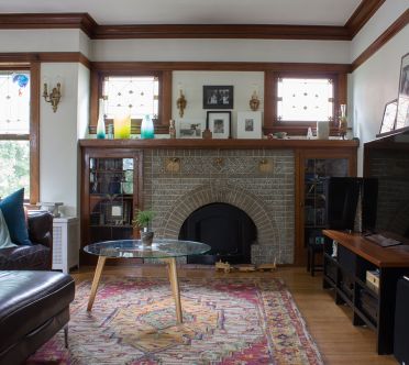 my-chicago-bungalow_b-interior_edited-(2-of-120) Chicago Bungalow Interior, Chicago Bungalow Remodel, Bungalow Fireplace, Craftsman Bungalow Interior, Craftsman Living Rooms, Bungalow Living Room, Chicago Bungalow, Sconces Fireplace, Antique Fireplace Mantels