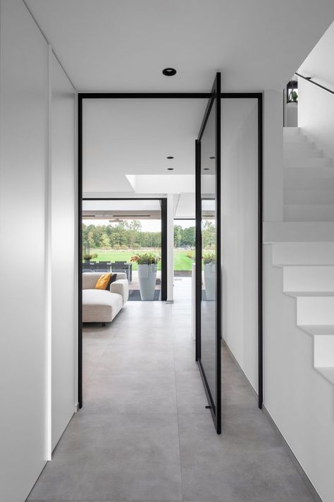 Beautiful glass pivot door made from black anodised aluminium with invisible Stealthpivot pivot hinge technology. This door is manufactured in 2019 by Belgian brand ANYWAYdoors. Doors Interior Modern, House Extension Design, Luxury Living Room Design, Glass Doors Interior, Interiors Dream, Pivot Doors, Corner House, House Stairs, House Flooring