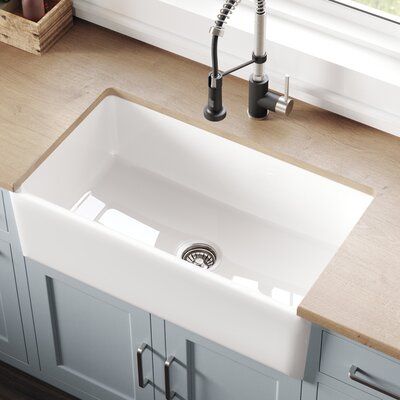 Kraus Experience authentic Italian craftsmanship with the Turino fireclay series from Kraus. Handcrafted in Italy with locally quarried materials, Turino farmhouse sinks exemplify a stunning union of time-tested quality and high-end contemporary style. Engineered with straight sidewalls and tight radius corners for maximized bowl space and a pronounced rectangular apron shape with a look of modern simplicity. Featuring a smart reversible design, the sink can be installed with either a modern fla Deep Sink, Apron Sink Kitchen, Farmhouse Aprons, Sink Grid, Farmhouse Traditional, Fireclay Sink, Bowl Kitchen Sink, Casa Exterior, Single Bowl Kitchen Sink