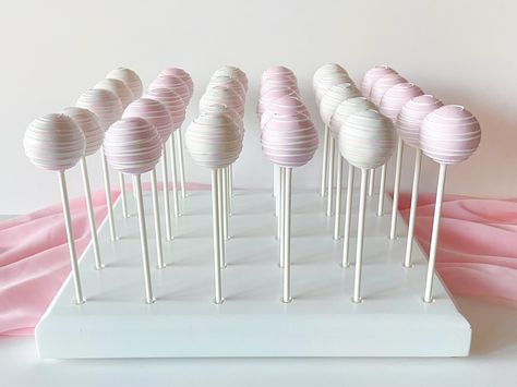 I love to get creative and go all out but I also love a simple clean design too. It’s just the classic Cake Pop that we all fell in love with! 💖 Chocolate used: @stoverandcompany Cake Pop stand: @cakepopbox #cakepops #pinkcakepops #roundcakepops #treatmaker #babyshowercakepops How To Make Smooth Cake Pops, How To Get Smooth Cake Pops, Ready To Pop Cake Pops, Shades Of Pink Cake Pops, Cake Pop Frosting Coating, Cake Pop Stand, Pink Cake Pops, Cake Pop Stands, Baby Shower Cake Pops